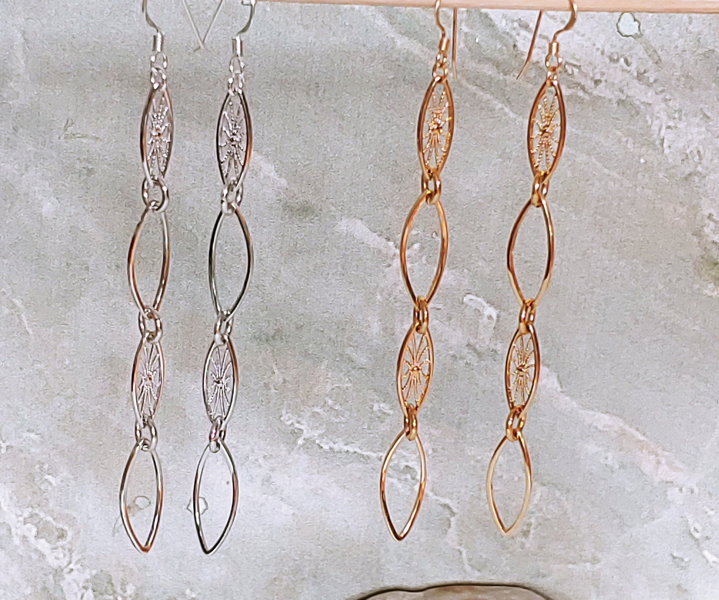 Leaf hoop and sunburst drop earrings in Rhodium and 24k gold plate