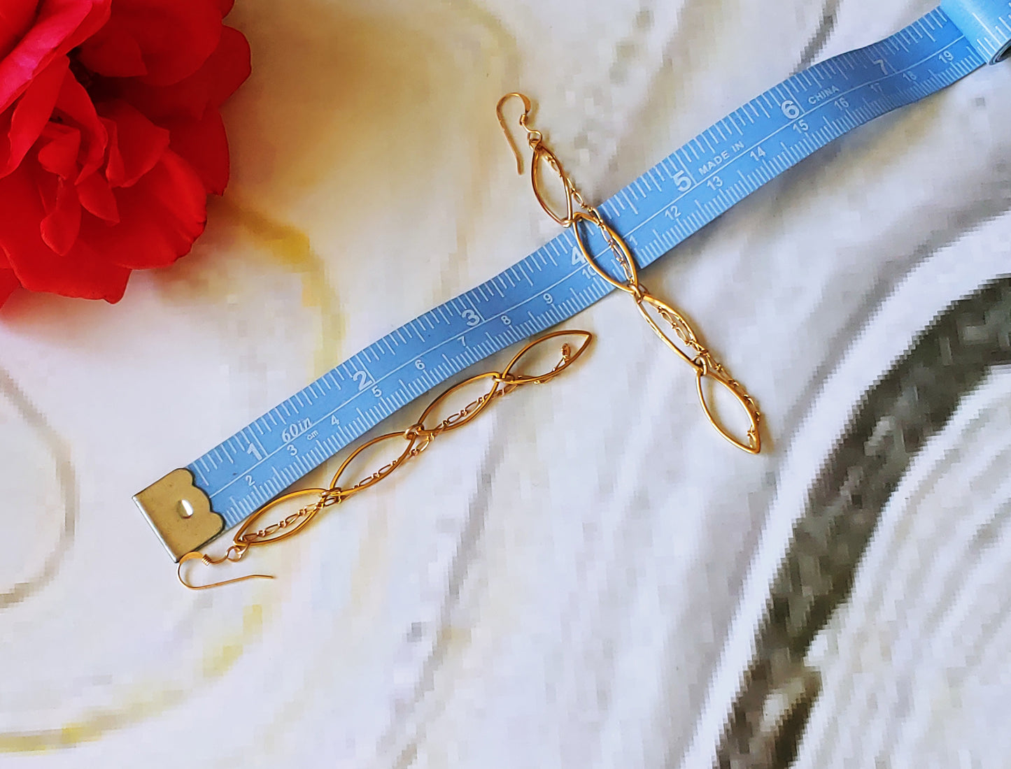 Leaf link drop hoop earrings