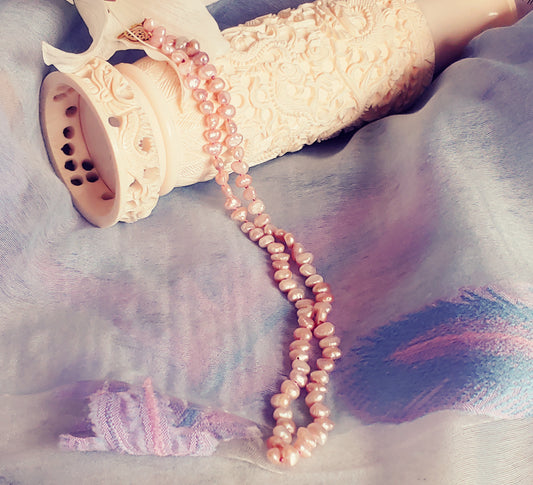 Side drilled salmon colored freshwater pearl necklace