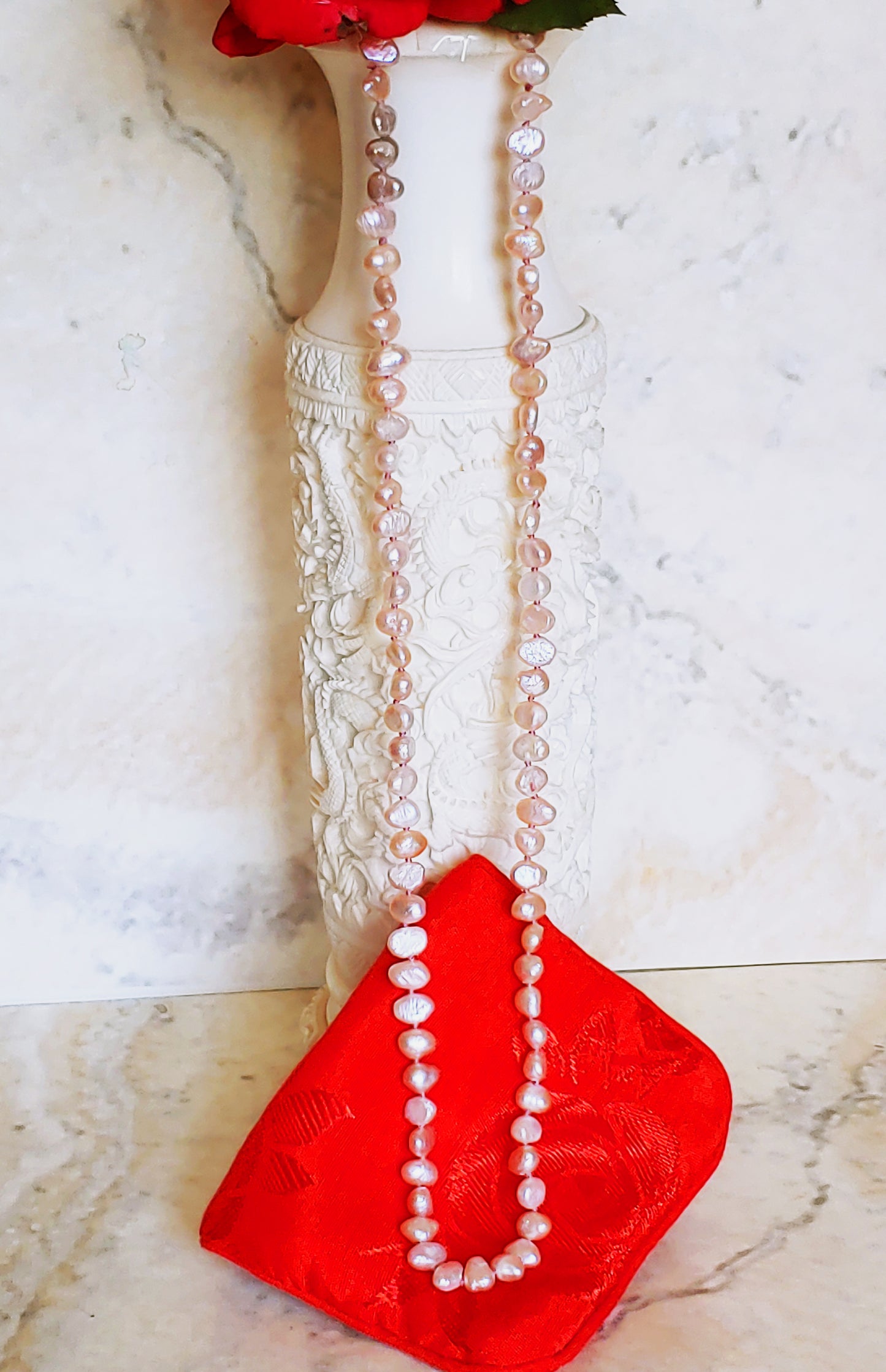 Side drilled salmon colored freshwater pearl necklace