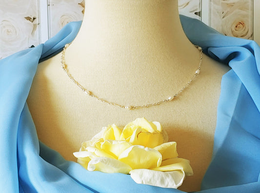 White freshwater pearl tincup necklace on sterling silver chain