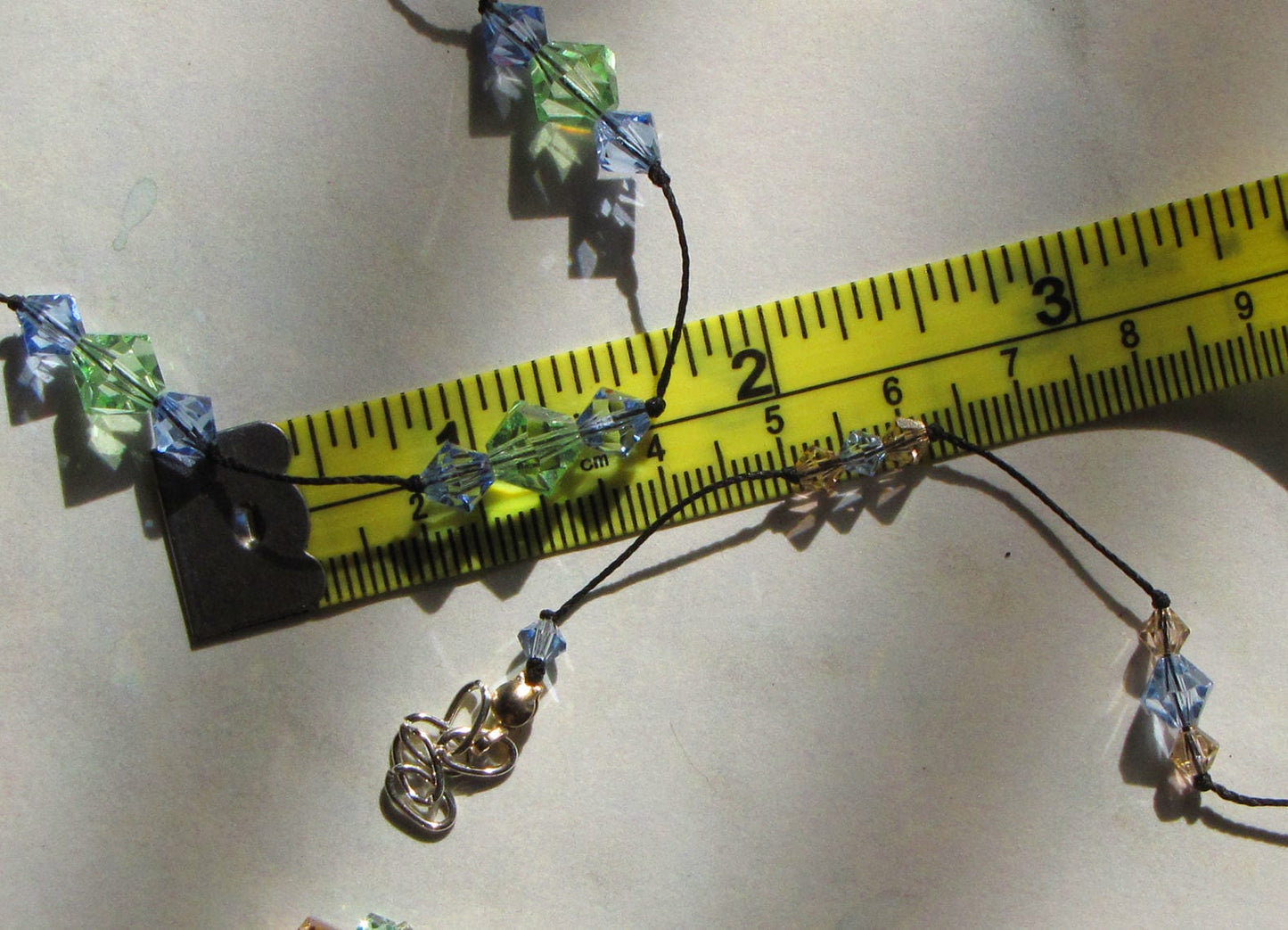 crystal floating necklace on silk cord