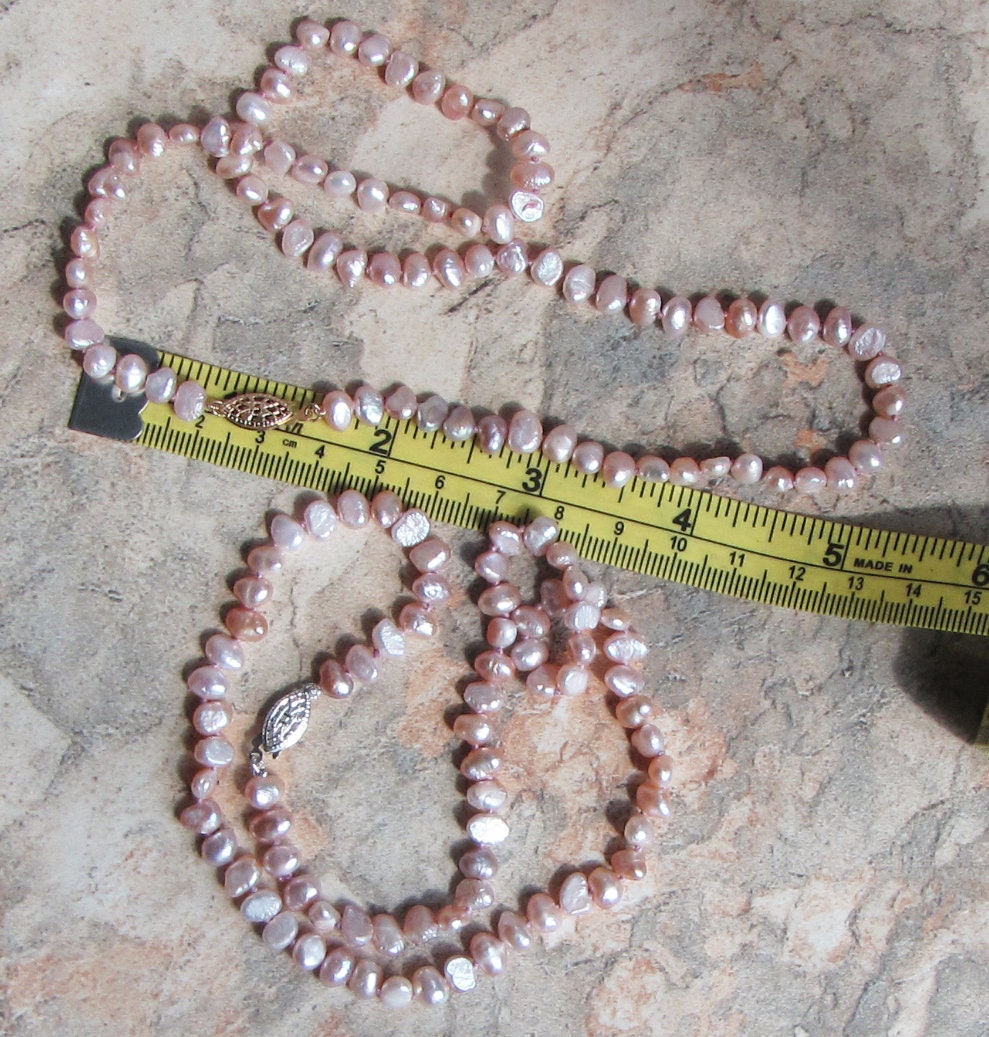 Side drilled salmon colored freshwater pearl necklace