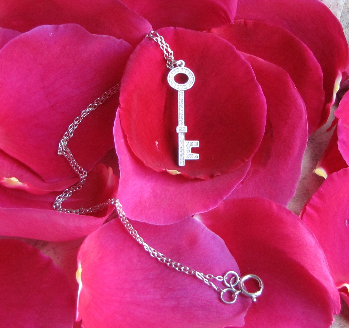 rhodium key pendant with cubic zirconia accents
