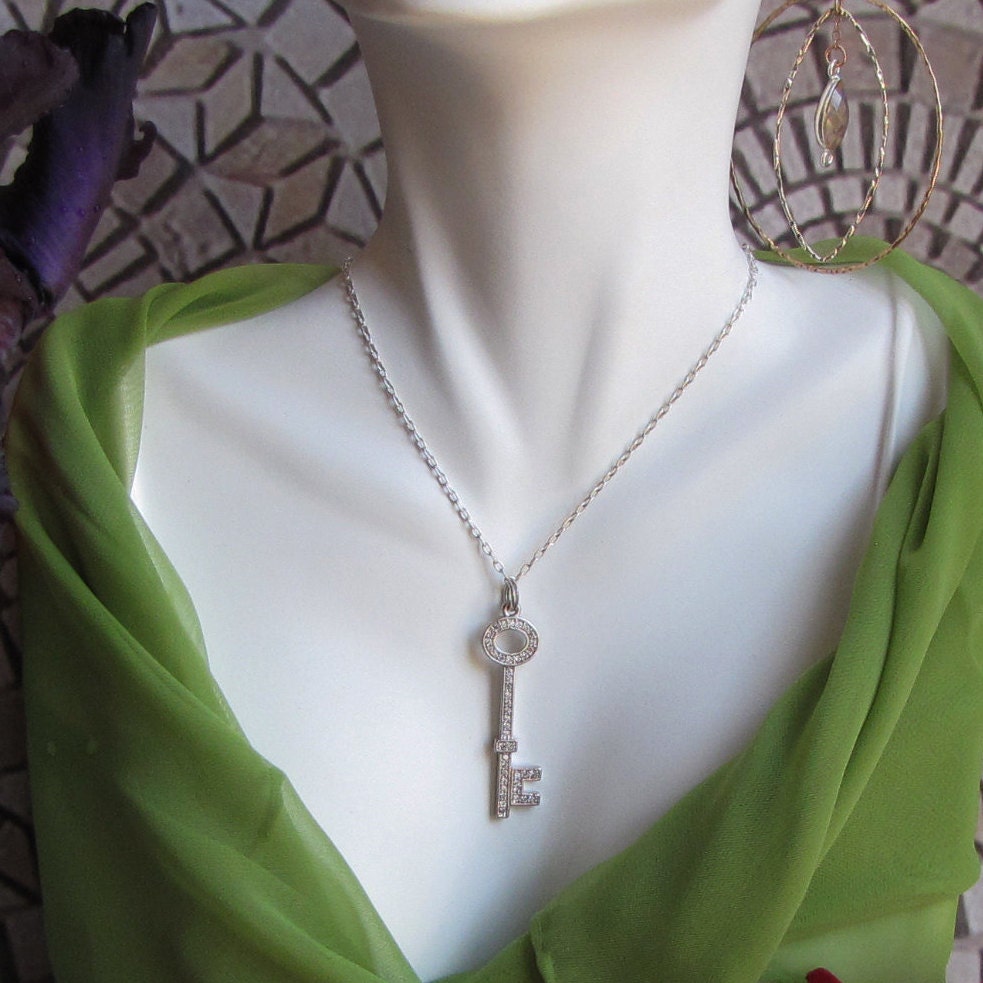 rhodium key pendant with cubic zirconia accents