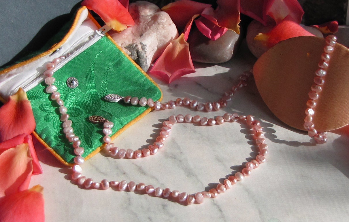 Side drilled salmon colored freshwater pearl necklace