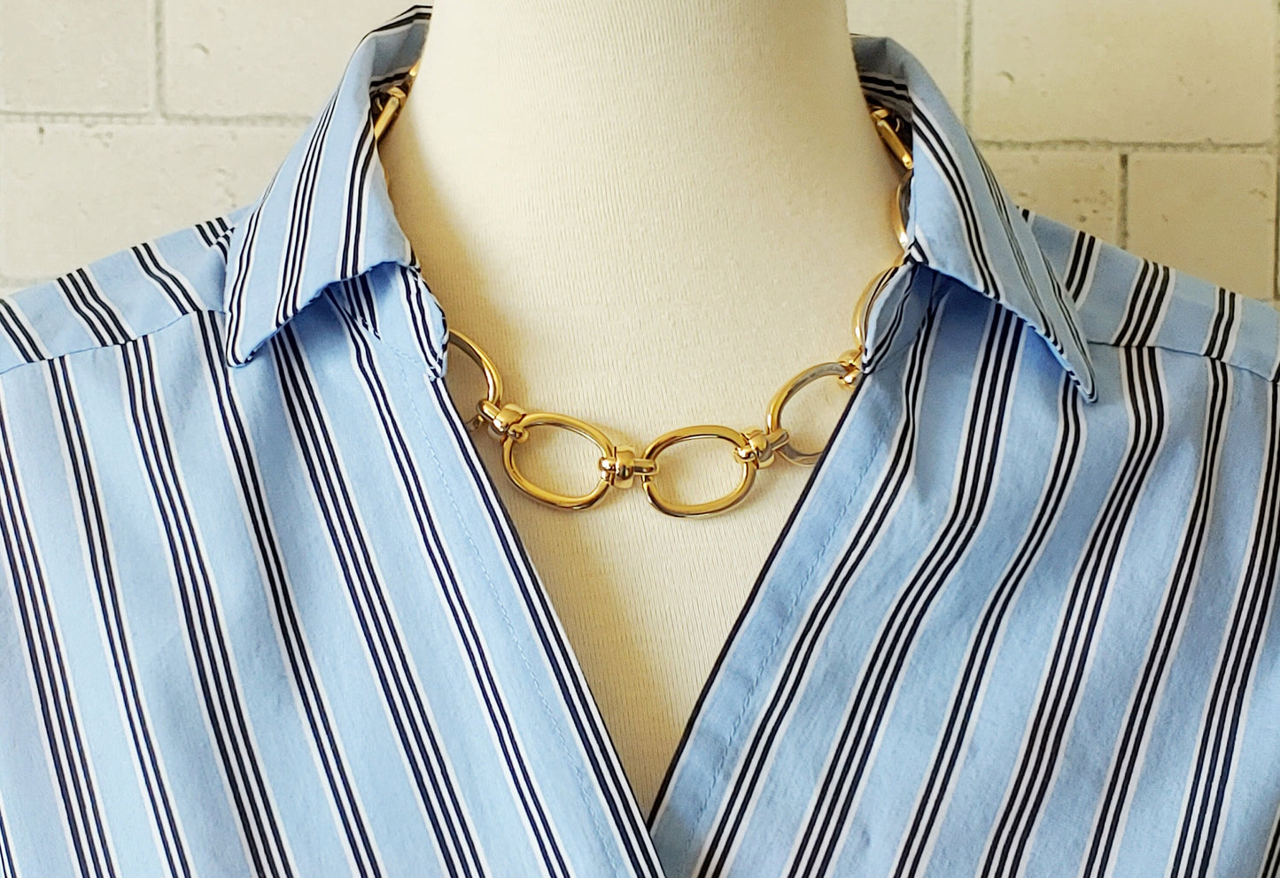 Spruce up a conservative look by letting it peep from under a collared shirt.