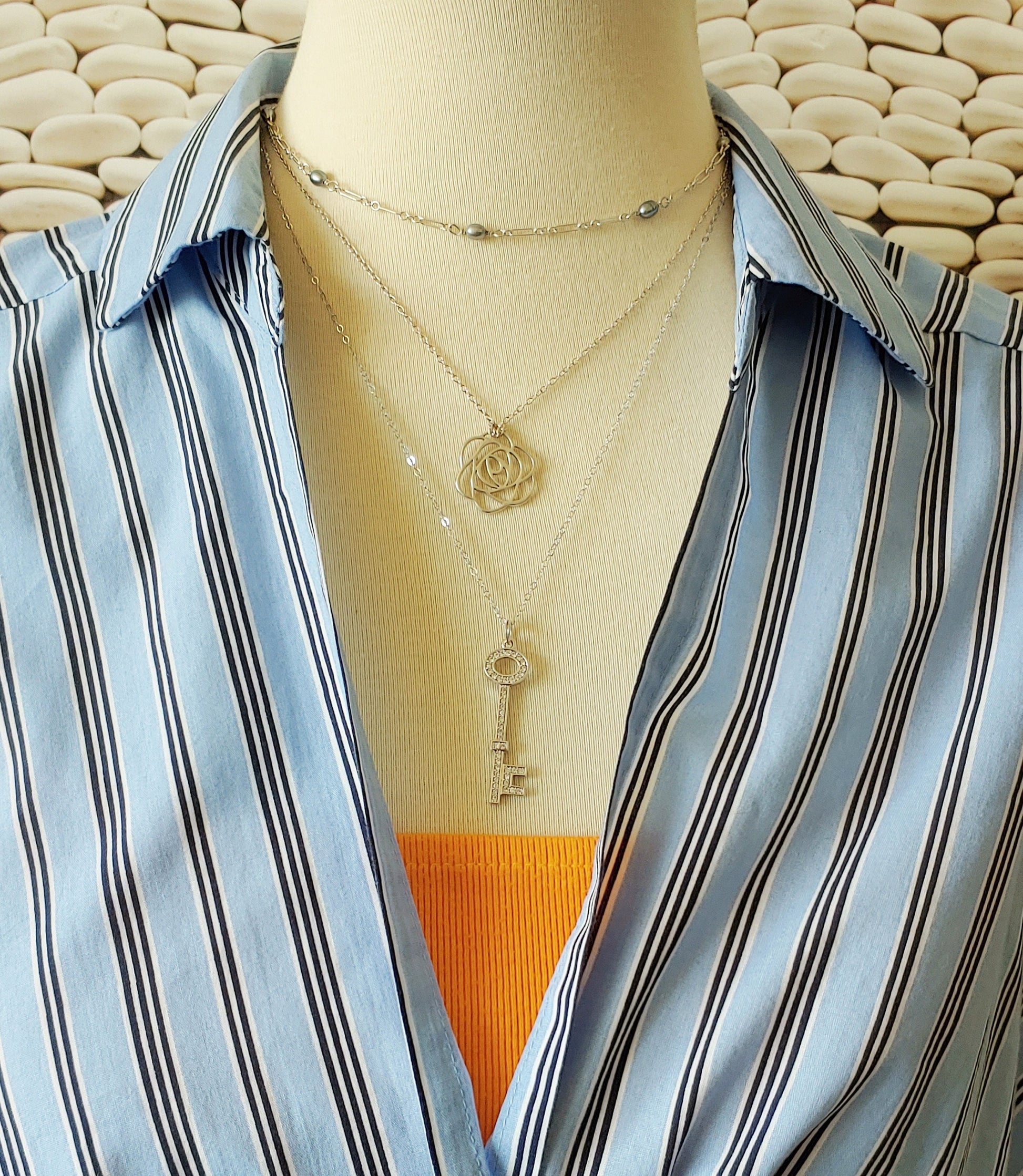 Can be worn as a layering piece.