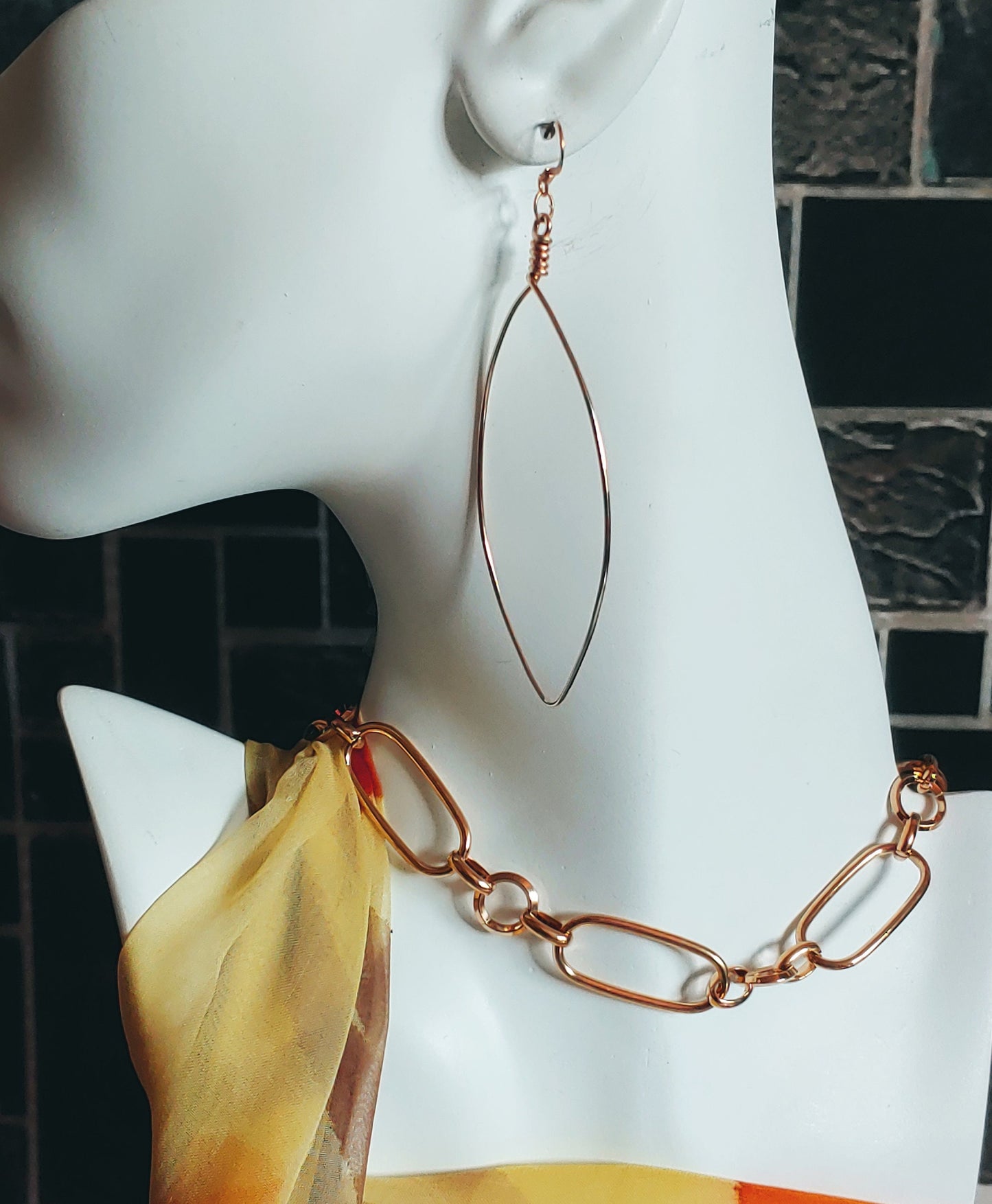 Our Marquise earrings pictured here with Lexington statement chain necklace in gold plate can be found through the link;
https://sgvjewelrydesigns.com/products/chunky-long-short-chain-necklace-in-gold-or-rhodium-plate