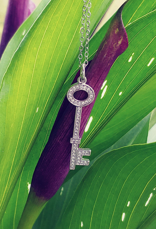 rhodium key pendant with cubic zirconia accents