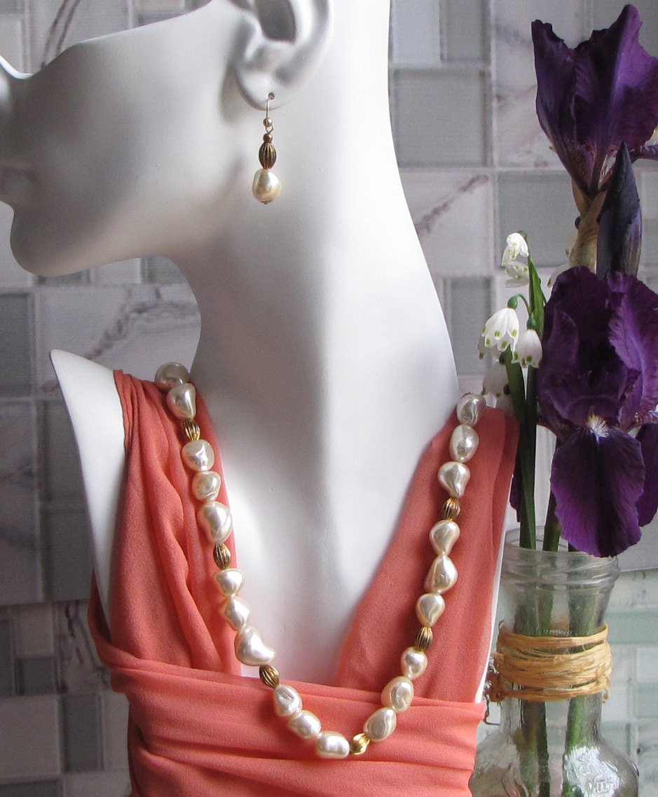 Simulated Baroque pearl necklace with matching earrings.