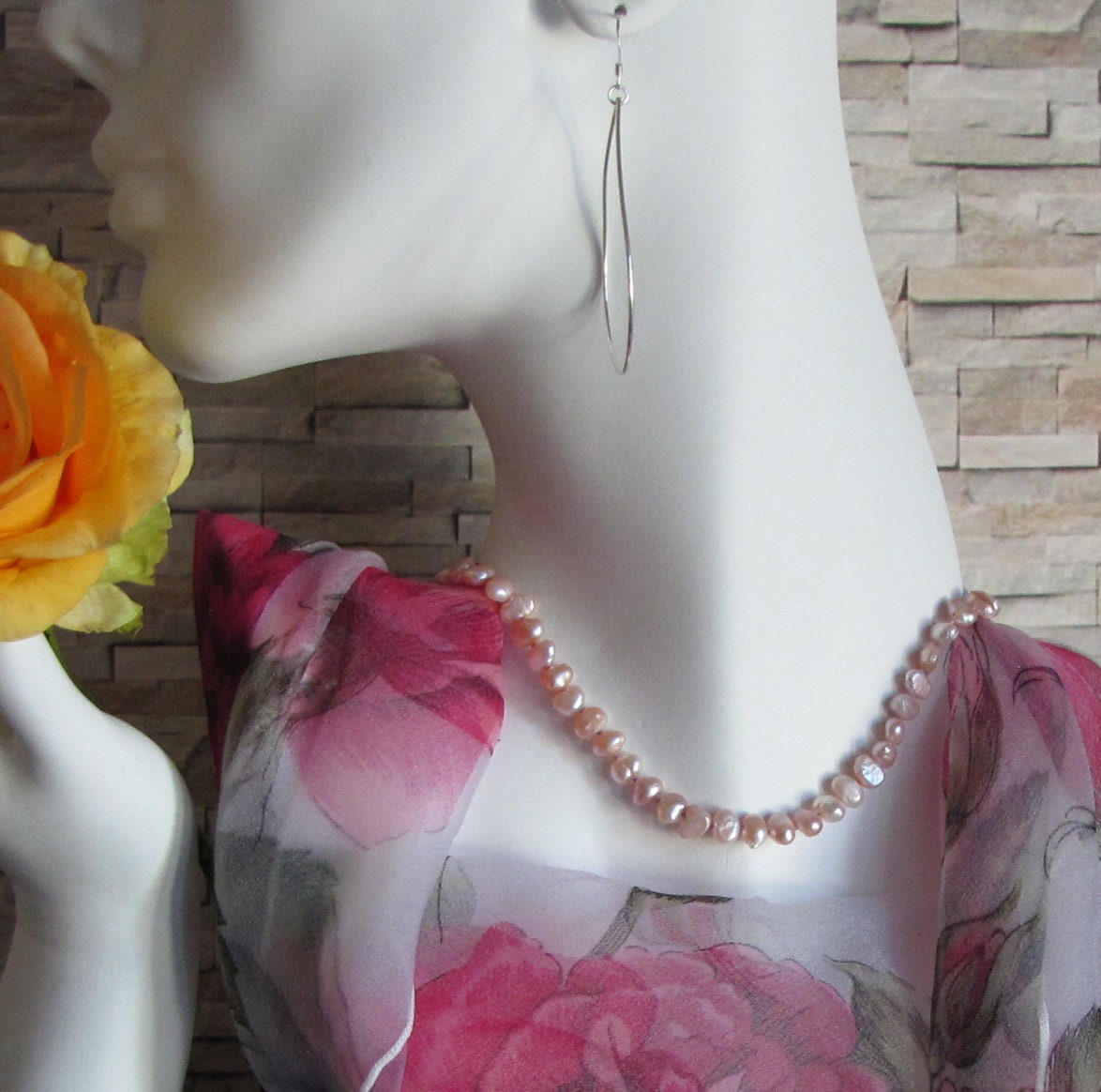 Side drilled salmon colored freshwater pearl necklace
