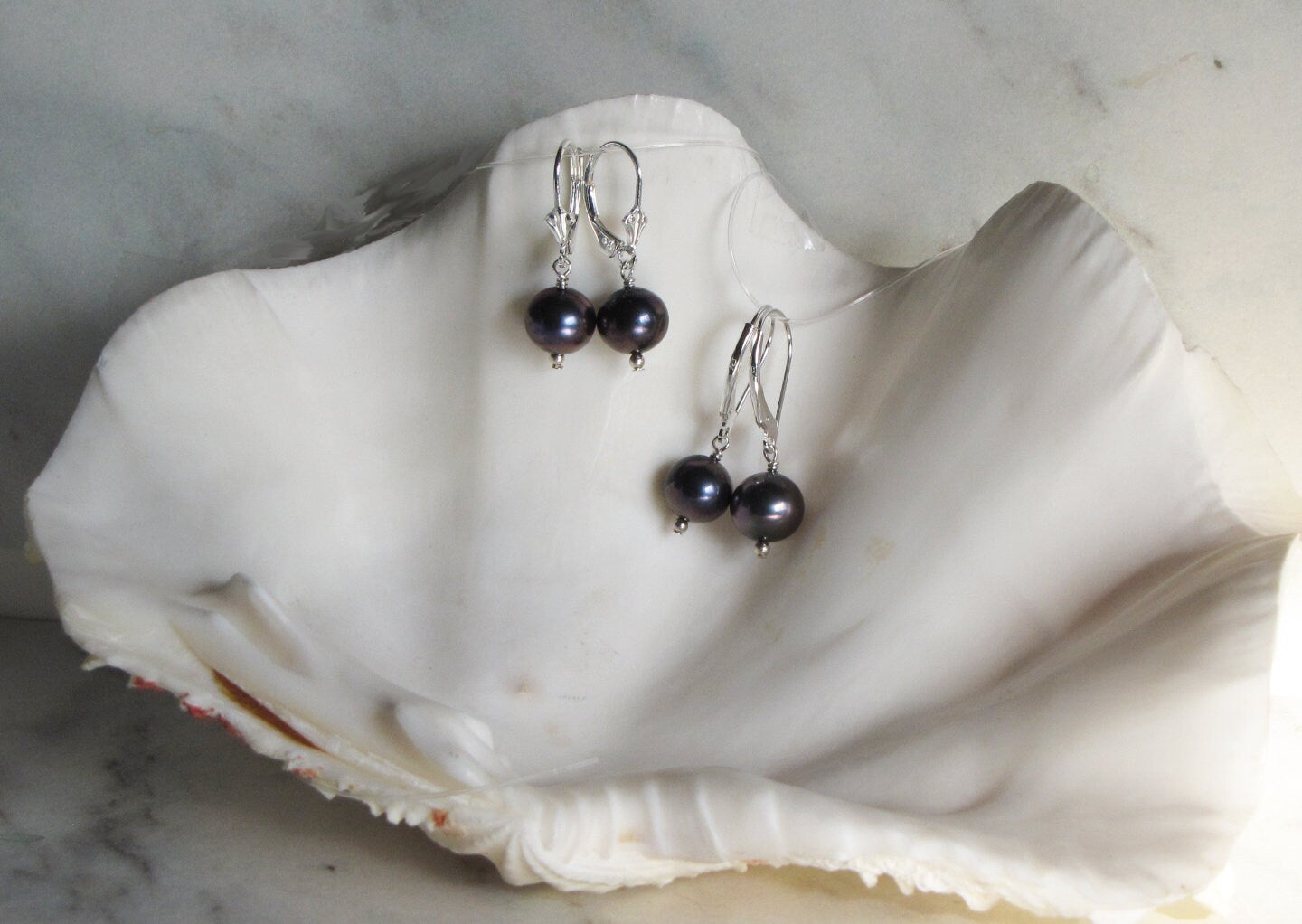 8.5mm black freshwater pearl Lever back drop pearl earrings in sterling silver