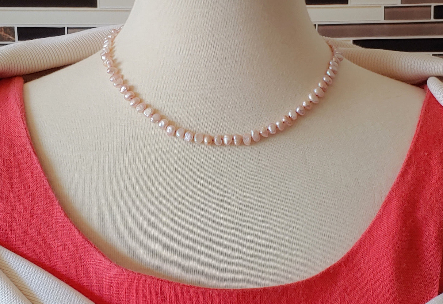 Side drilled salmon colored freshwater pearl necklace