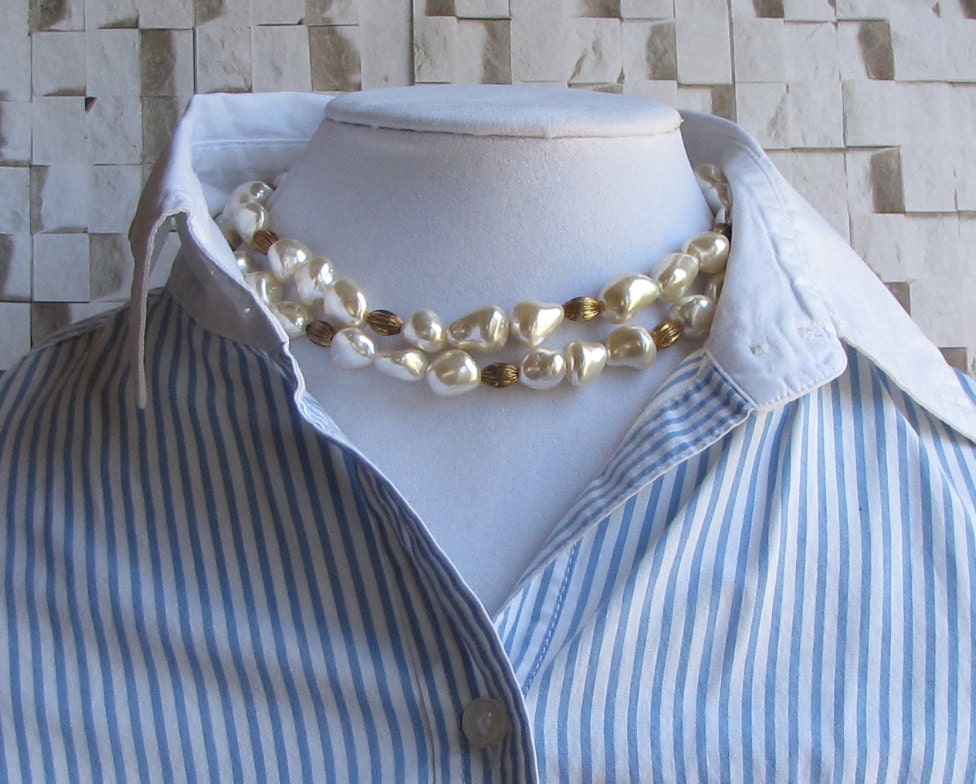 Simulated Baroque pearl necklace with matching earrings.