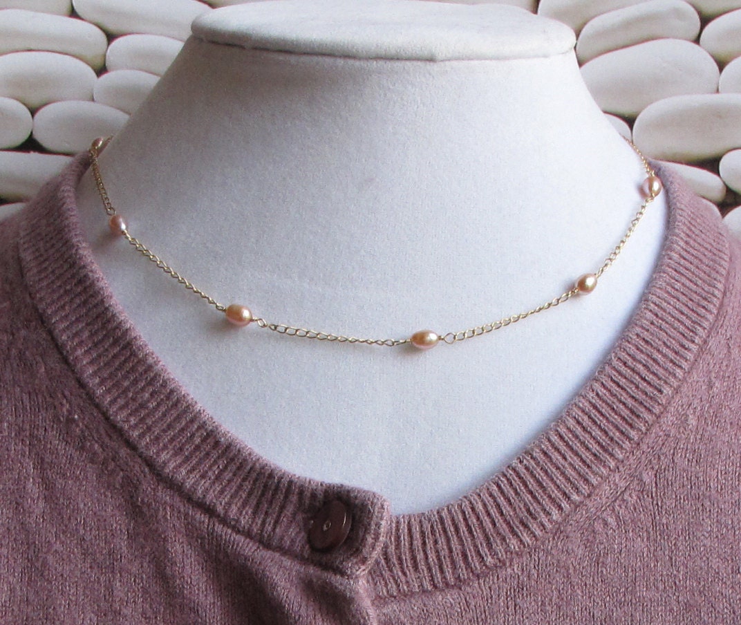 Salmon colored freshwater pearl tin cup necklace and earring set